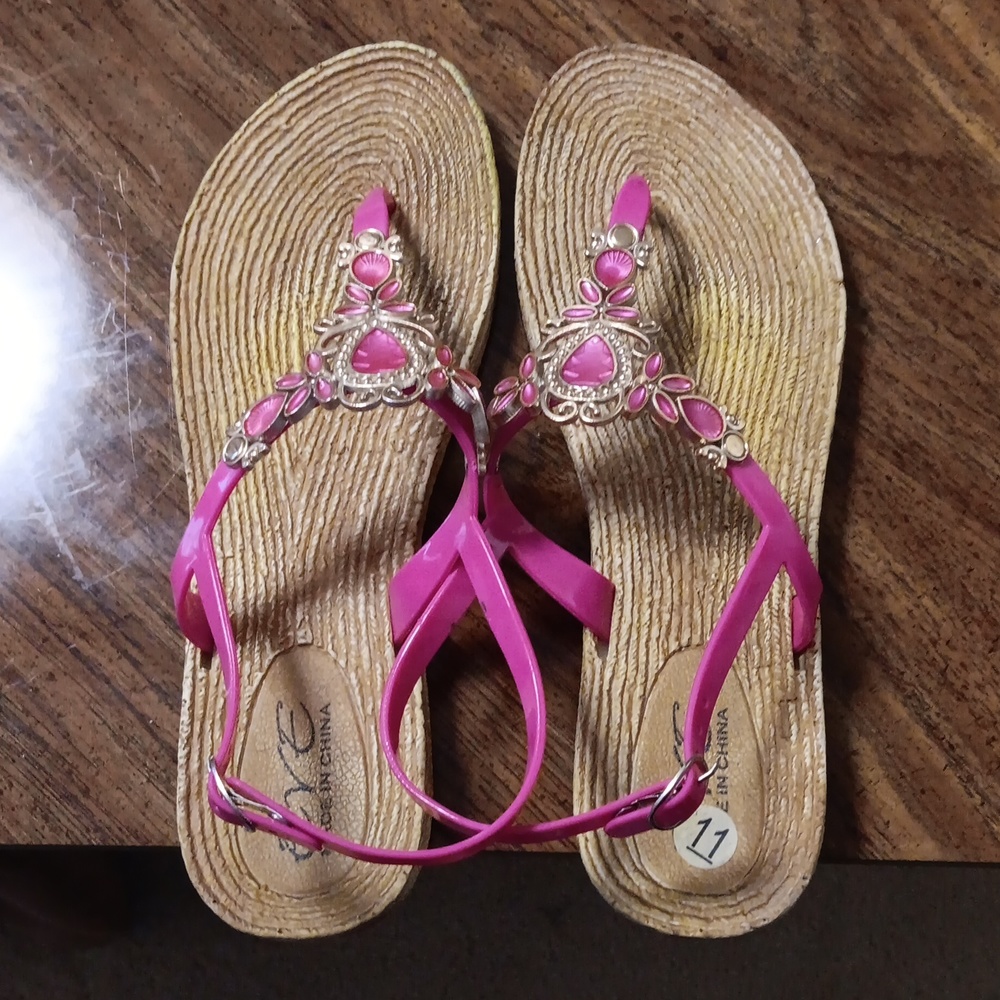 Pink thong type sandels.
